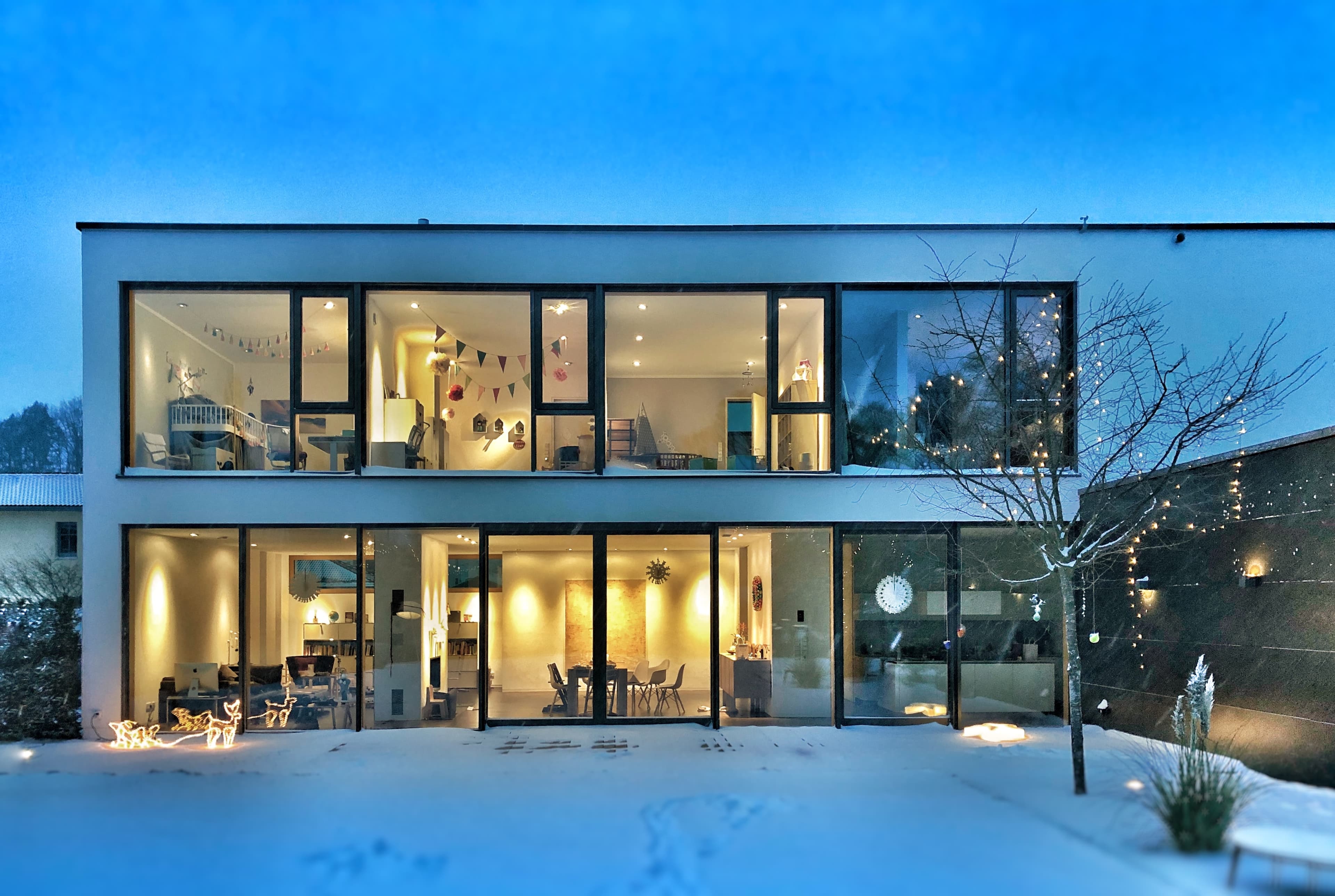 Modern home with premium aluminium glazing at dusk