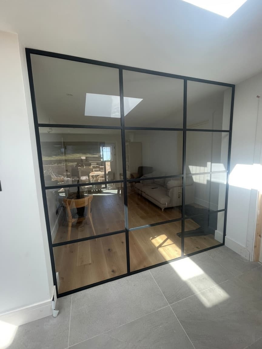 Crittall-style glass partition installed by JJT Aluminium